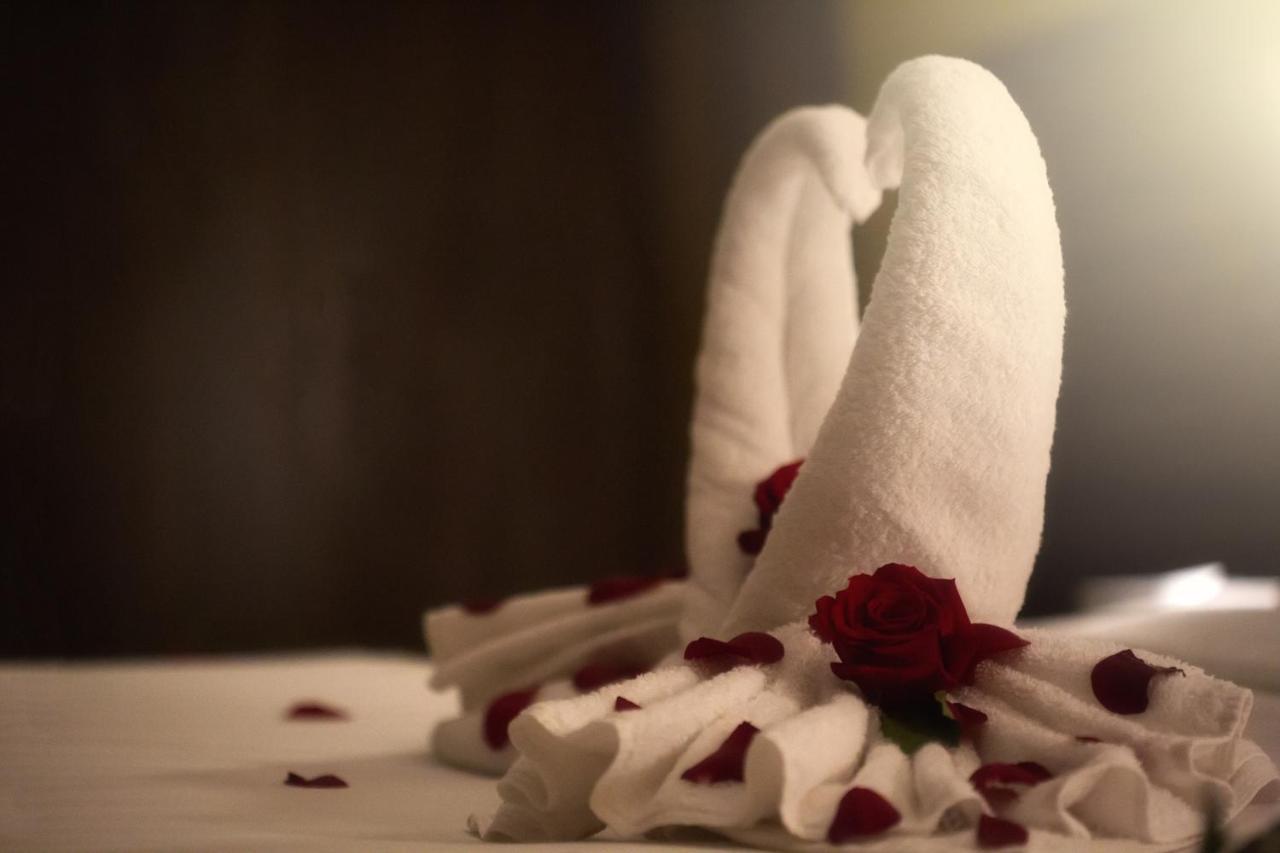 Al Safwah Orchid Hotel Mekka Buitenkant foto Towel swans