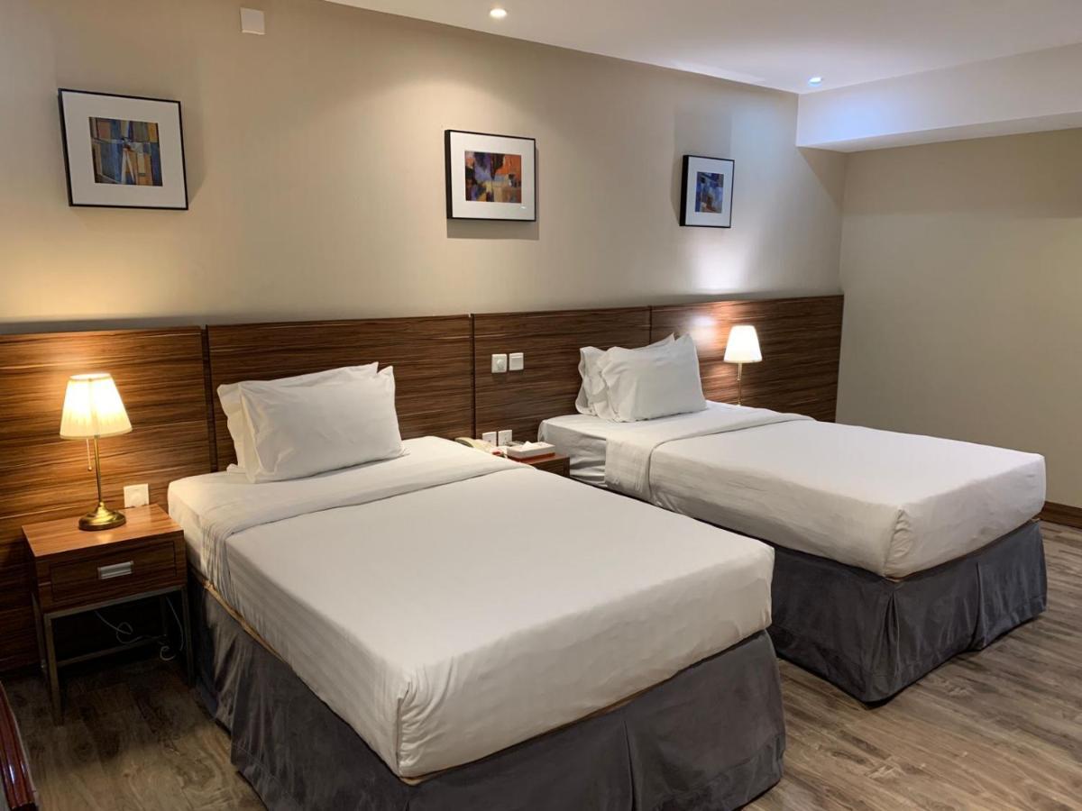 Al Safwah Orchid Hotel Mekka Buitenkant foto Deluxe Twin Room