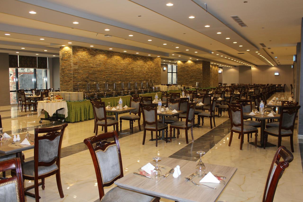 Al Safwah Orchid Hotel Mekka Buitenkant foto The restaurant