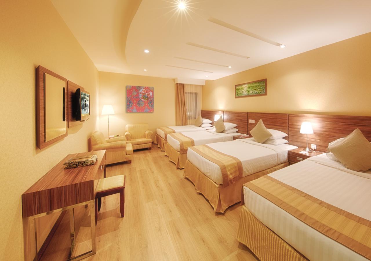 Al Safwah Orchid Hotel Mekka Buitenkant foto Family room