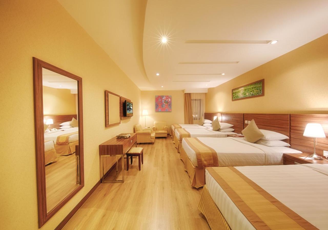 Al Safwah Orchid Hotel Mekka Buitenkant foto Family room