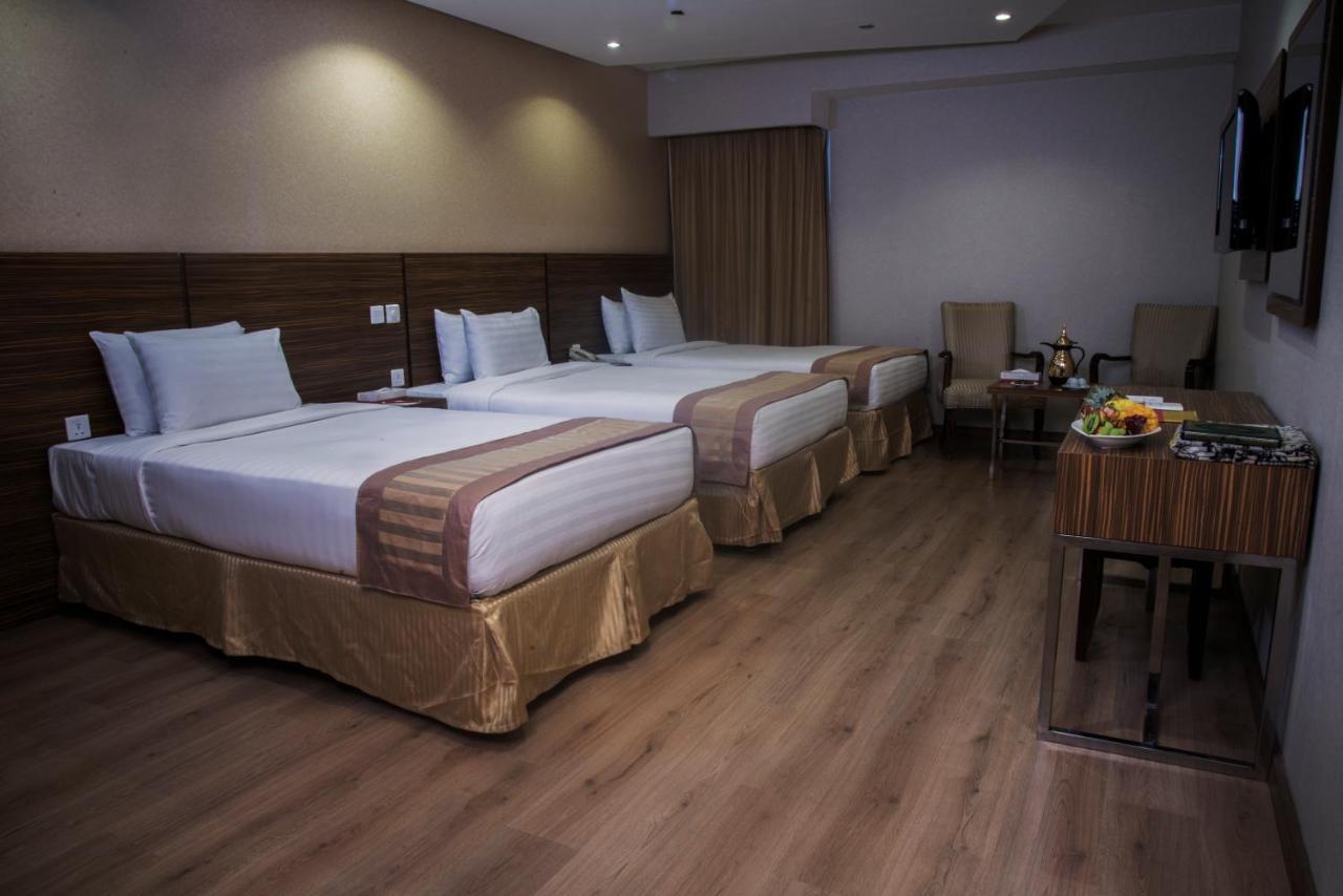 Al Safwah Orchid Hotel Mekka Buitenkant foto Family room