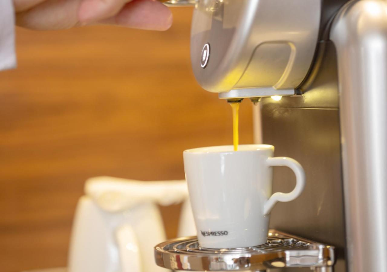Al Safwah Orchid Hotel Mekka Buitenkant foto A Nespresso machine